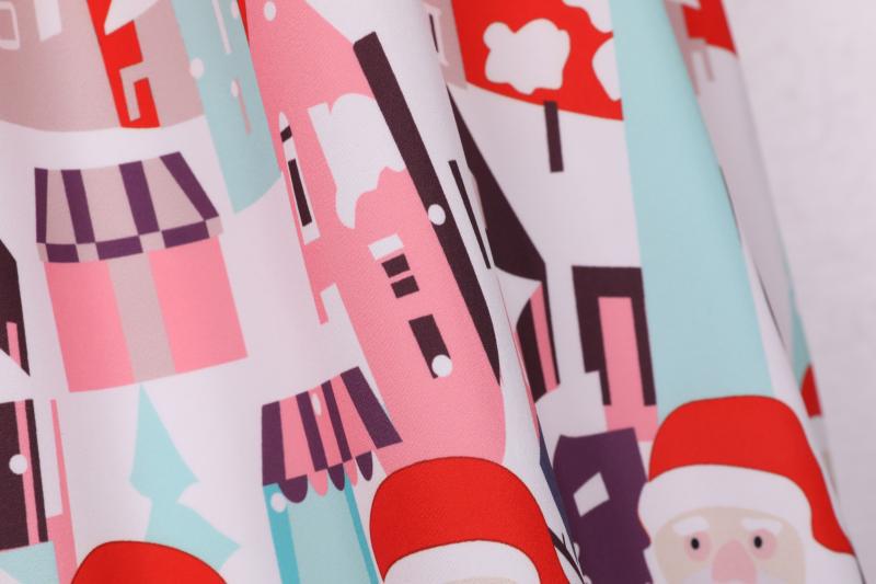 Women's short-sleeved Christmas swing dress with a Christmas village print