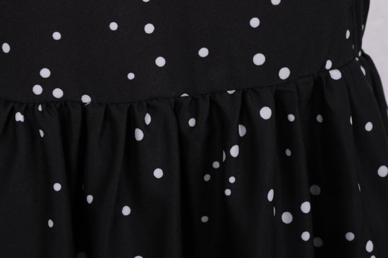 Women's short-sleeved Christmas swing dress with a Christmas village print