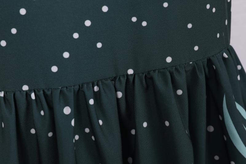 Women's short-sleeved Christmas swing dress with a Christmas village print