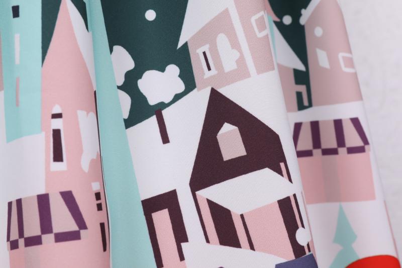 Women's short-sleeved Christmas swing dress with a Christmas village print