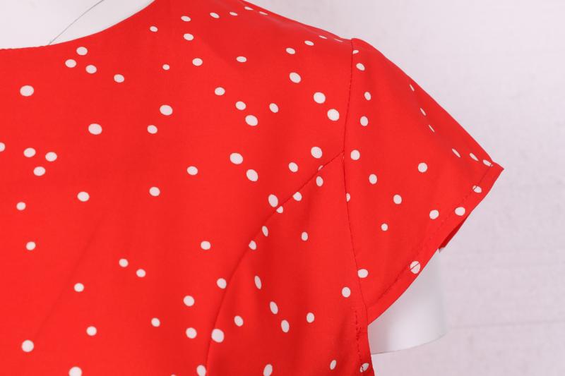 Women's short-sleeved Christmas swing dress with a Christmas village print