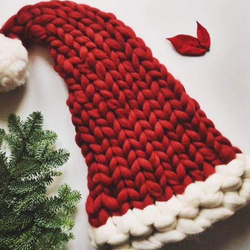 Chunky knit Christmas hat with a thick white trim and white pompom - red