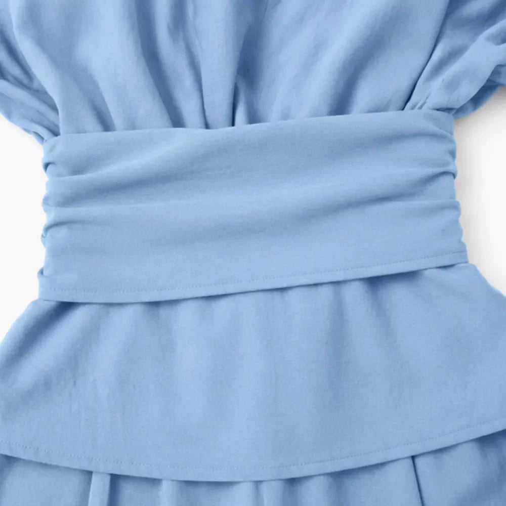 Women's two-piece peplum and trouser set - detail