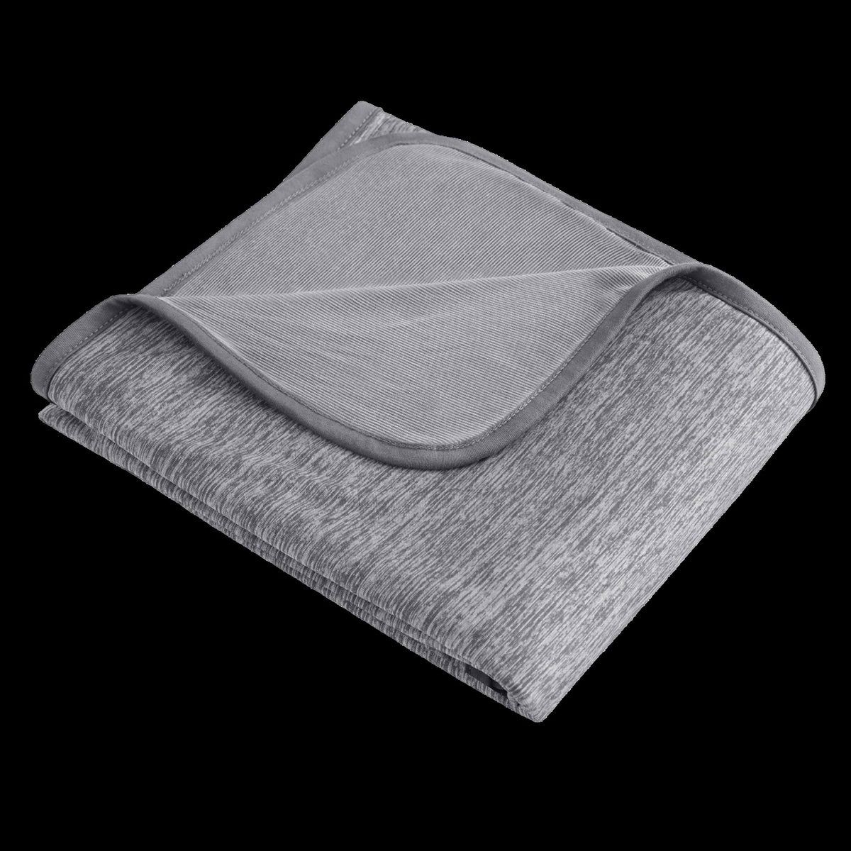 Reversible cooling blanket over a made bed - view 4
