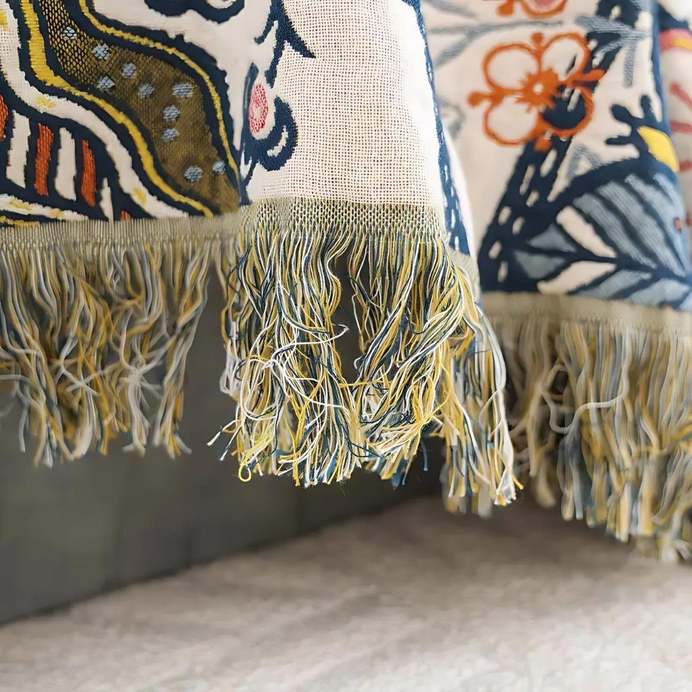 Cotton jacquard throw with a floral pattern and fringe over a sofa - view 6