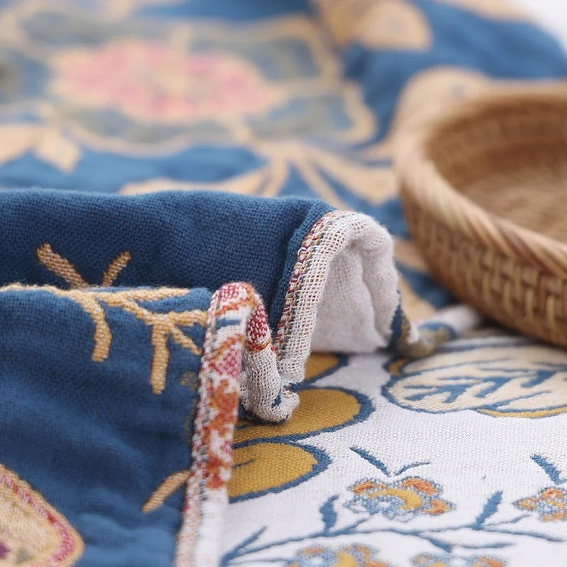 Cotton jacquard throw with a floral pattern and fringe over a sofa - view 7