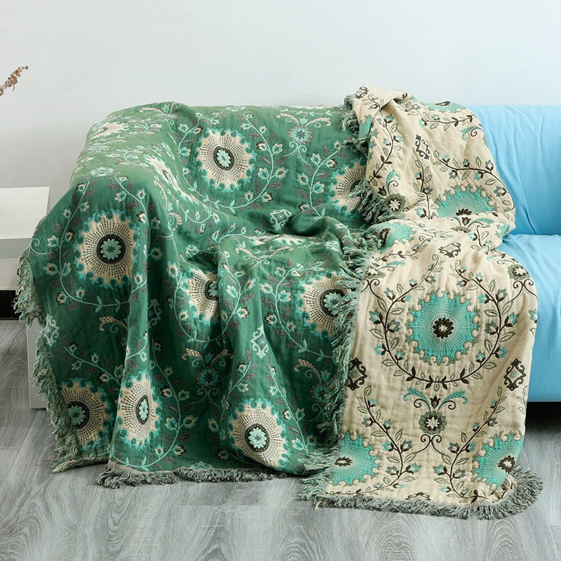 Reversible cotton throw with a medallion pattern and fringe - green