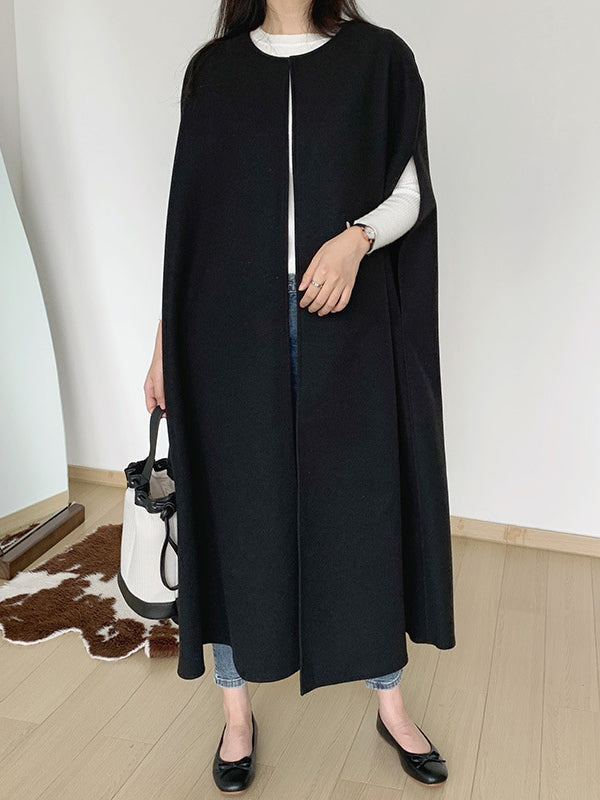Sleeveless longline cape with a round neck and open front in black