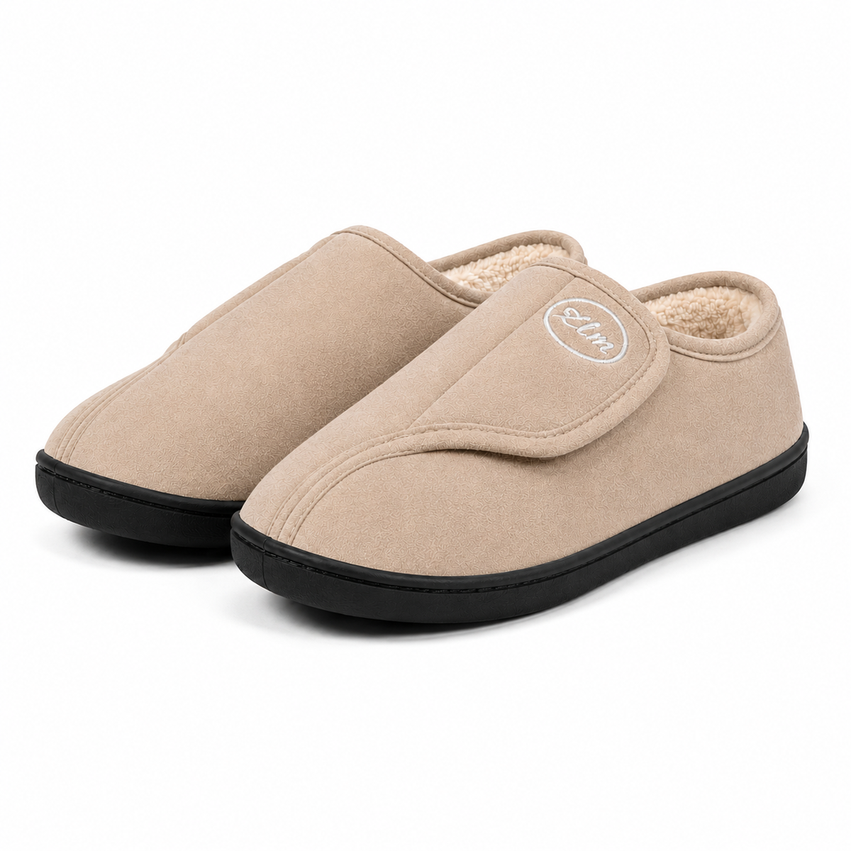 Unisex wide-fit slippers in a suede look with a touch-close strap and fleece lining in sand