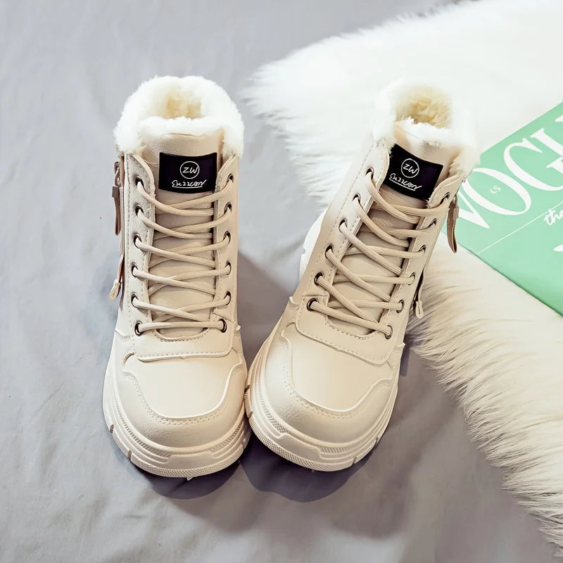 Chunky lace-up ankle boots with a faux fur lining and a platform sole