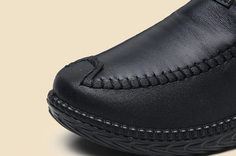 Leather-look ankle boots with a side zip and a thick faux fur lining