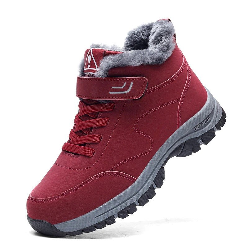 Unisex winter boots with a velcro strap over the lace and a fur lining in wine red