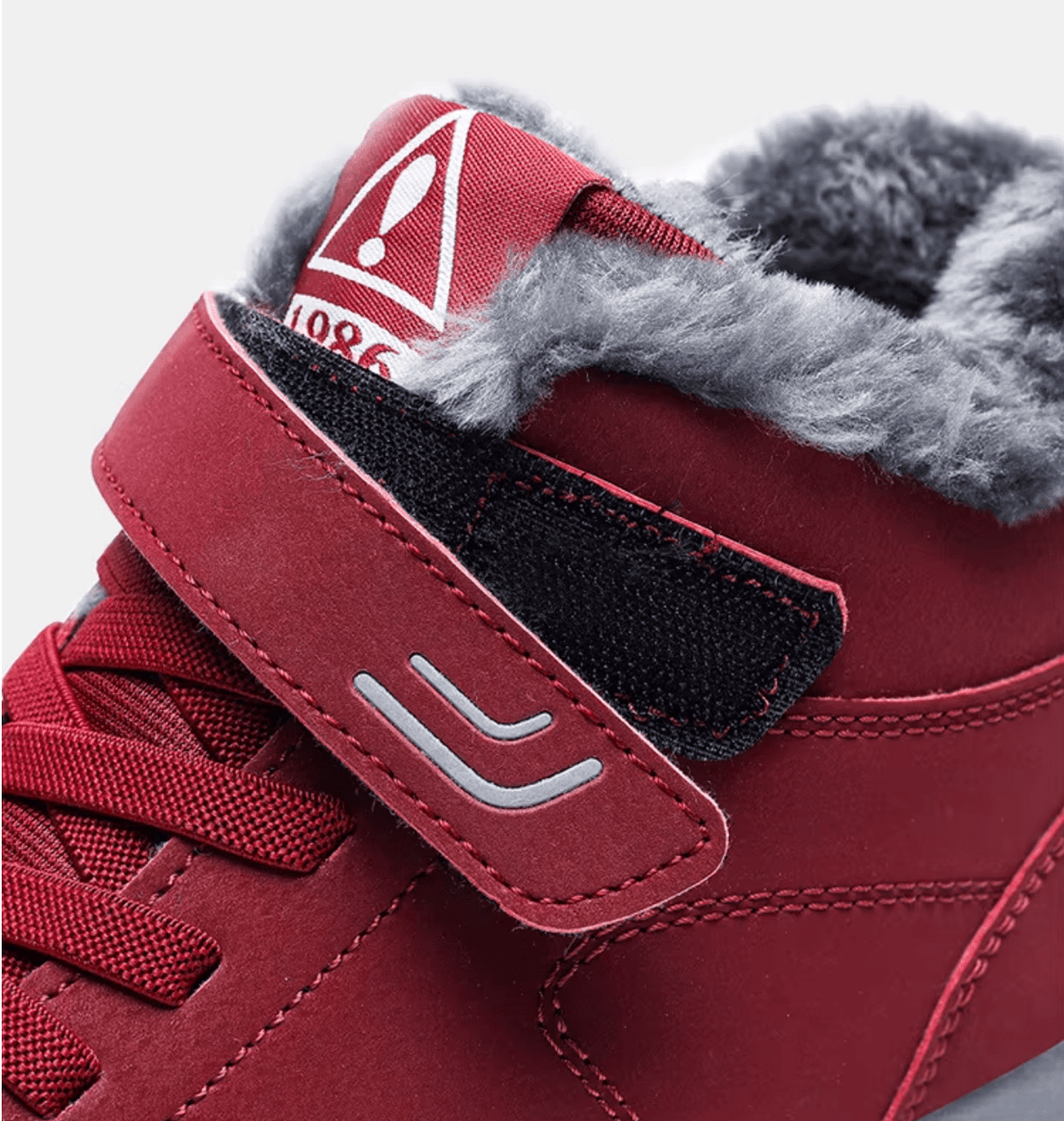Unisex winter boots with a velcro strap over the lace and a fur lining