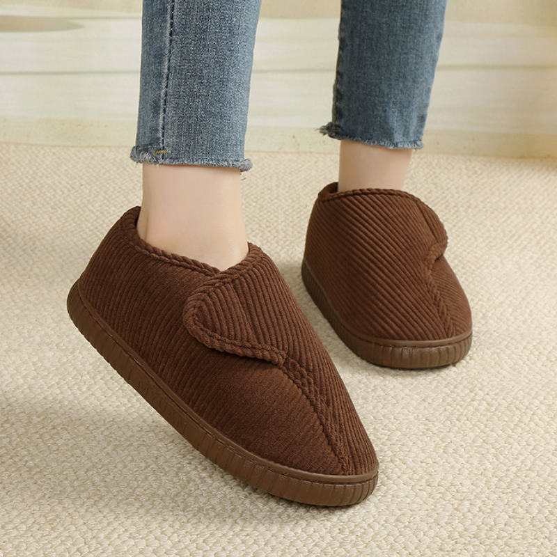 Unisex corduroy house shoes with an adjustable strap and a fleece lining