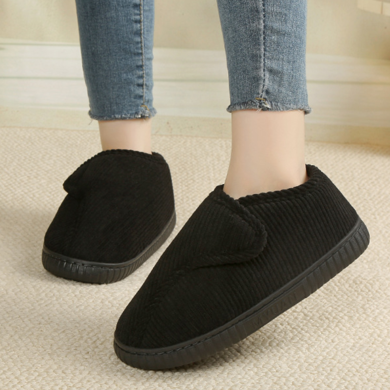 Unisex corduroy house shoes with an adjustable strap and a fleece lining