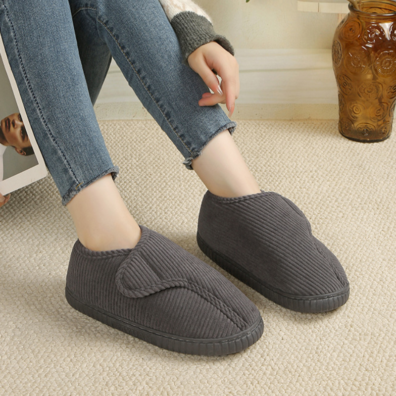 Unisex corduroy house shoes with an adjustable strap and a fleece lining