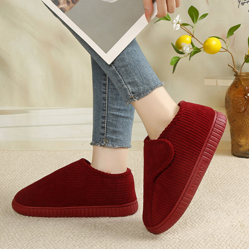 Unisex corduroy house shoes with an adjustable strap and a fleece lining