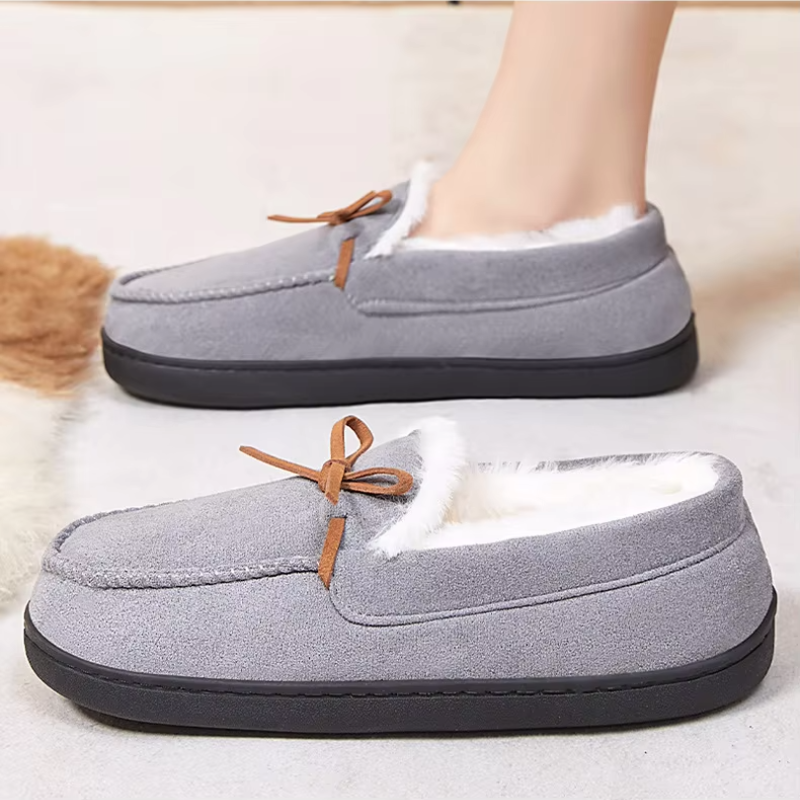 Women's moccasin slippers with a tied bow and a fleece lining