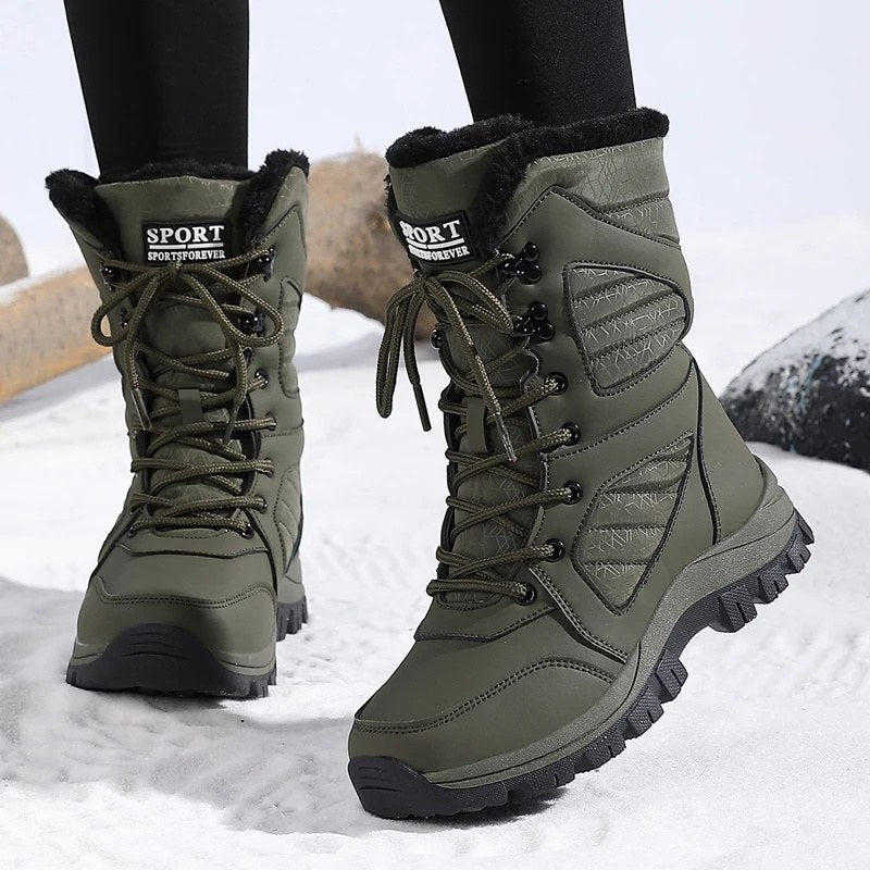 High snow boots with a faux fur cuff and a deep lug sole