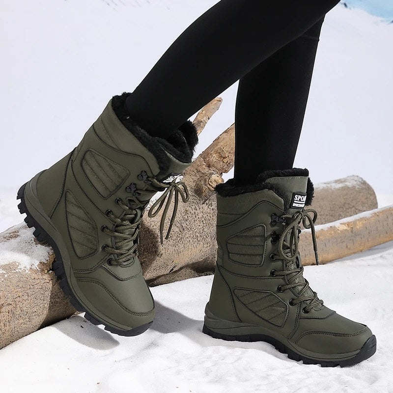 High snow boots with a faux fur cuff and a deep lug sole