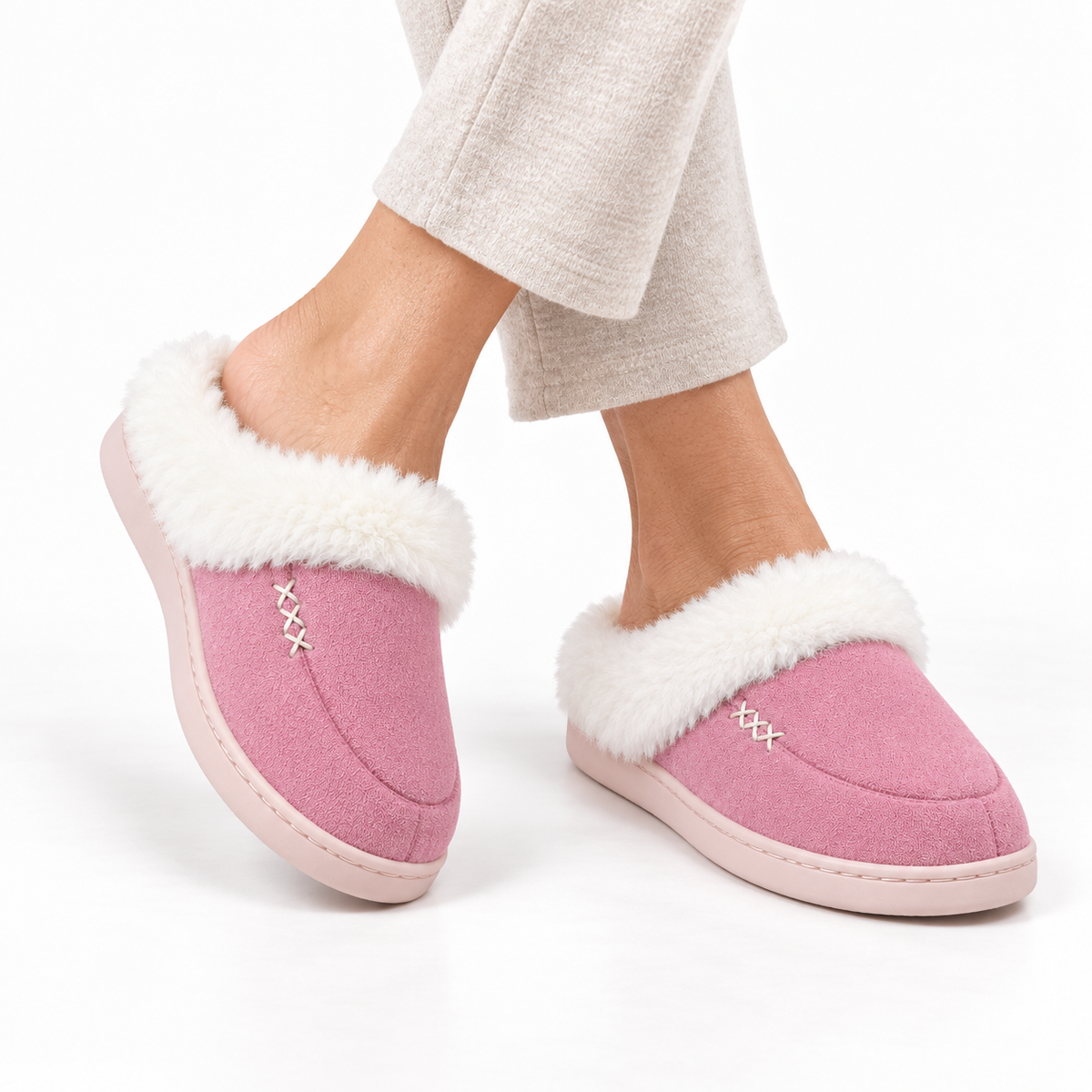 Women's slippers with a deep faux fur cuff and a cross-stitch detail