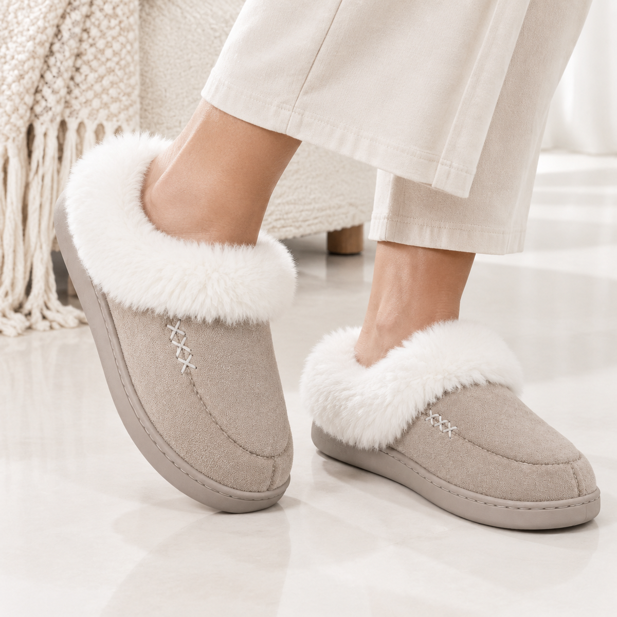 Women's slippers with a deep faux fur cuff and a cross-stitch detail