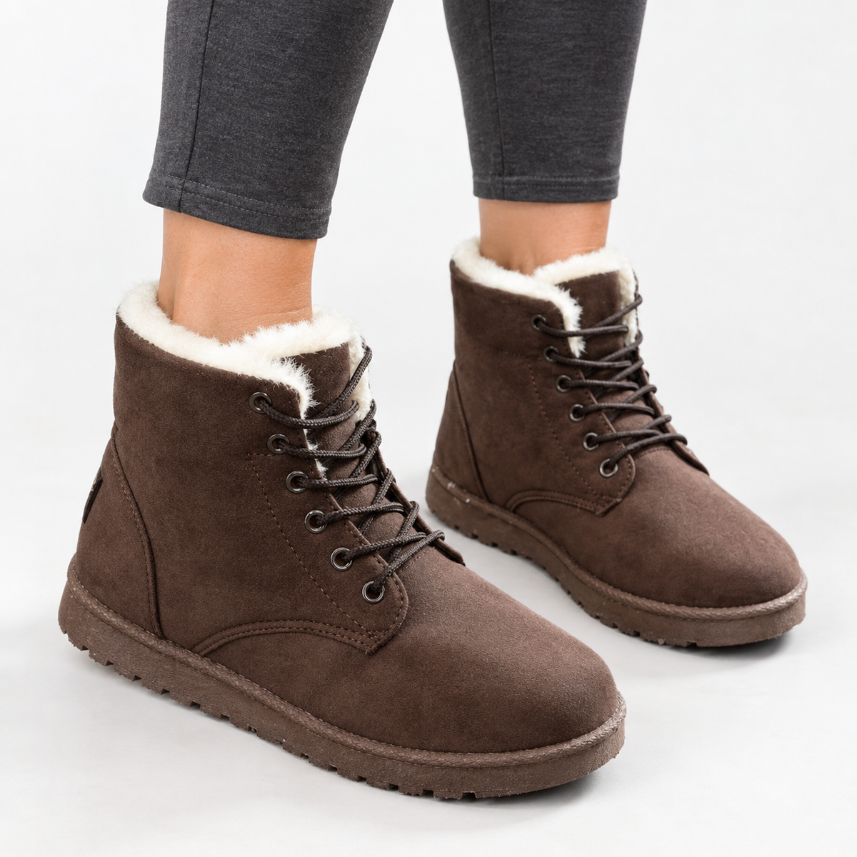 Lace-up winter ankle boots in a suede look with a faux fur collar