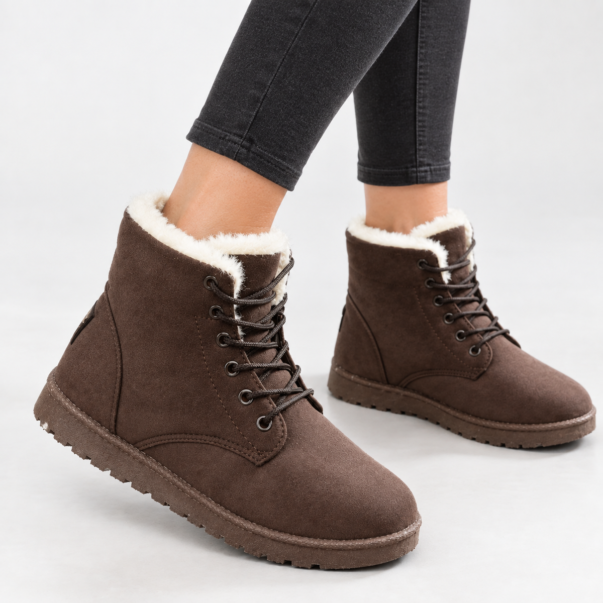Lace-up winter ankle boots in a suede look with a faux fur collar