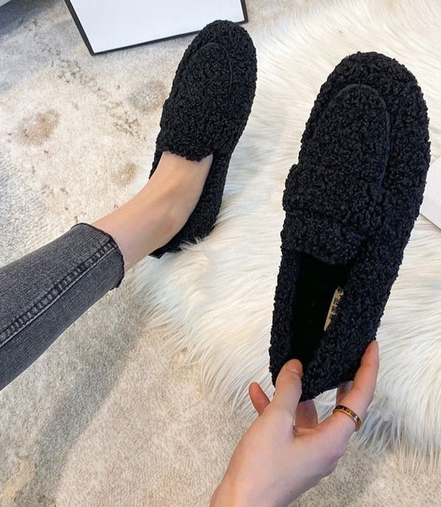 Women's teddy fleece loafer slippers with a wide band and a lug sole