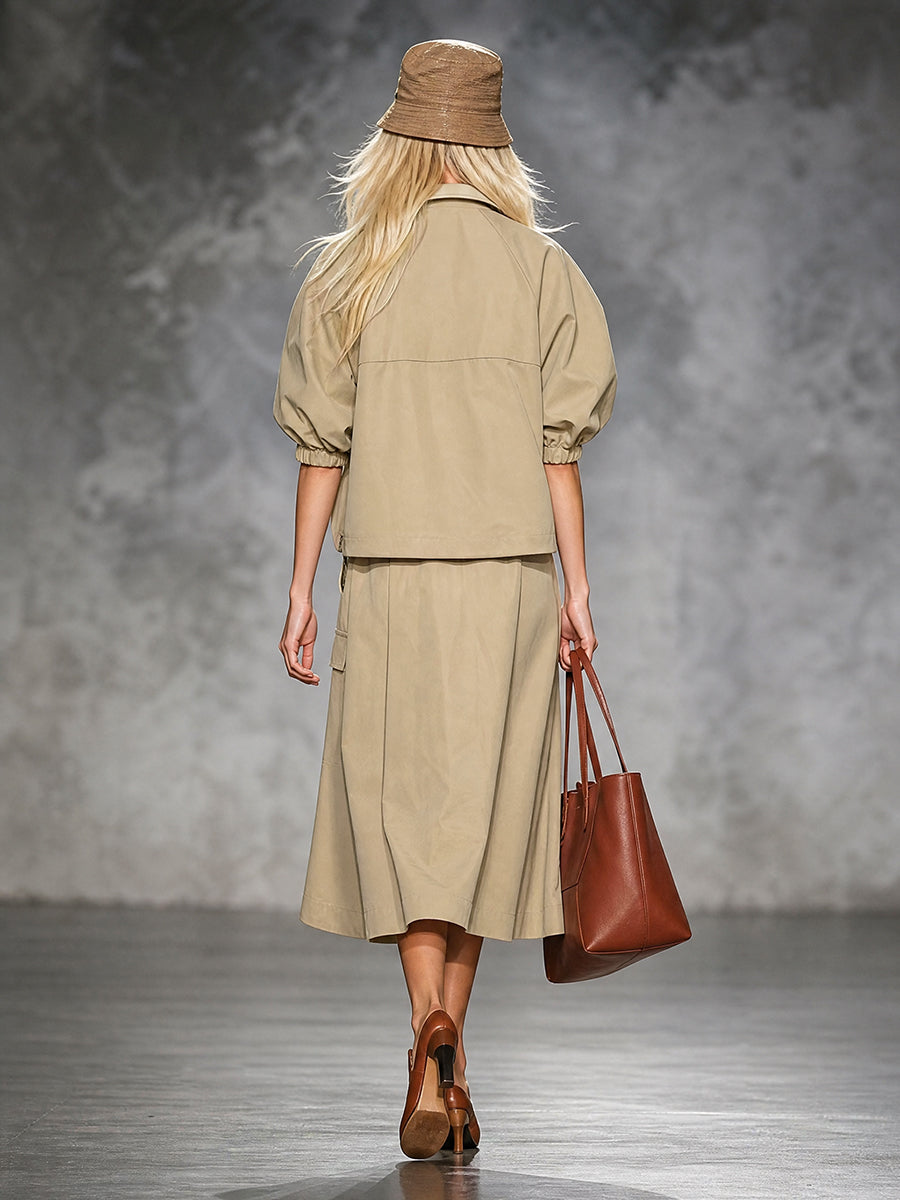 Khaki jacket with rust contrast piping and gathered puff sleeves