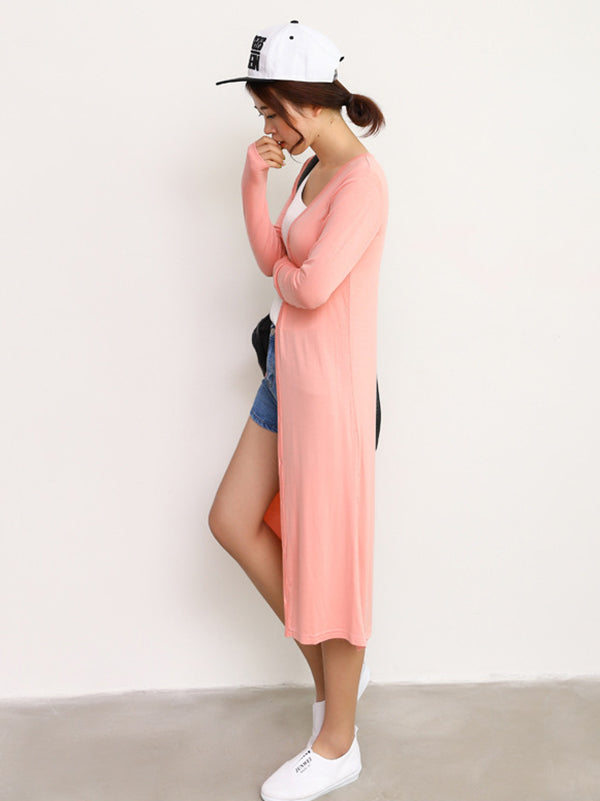 Light longline cardigan hanging open with dropped shoulders