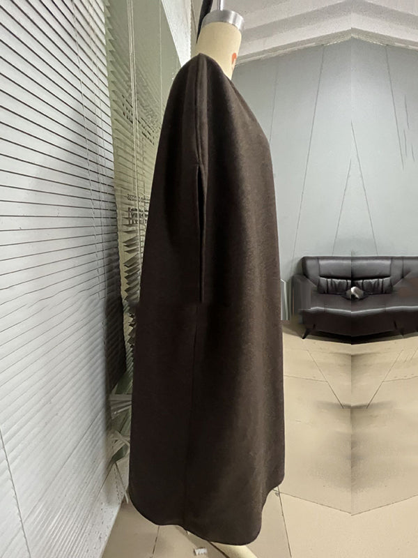 Sleeveless wool-blend cape with a round neck and a curved hem