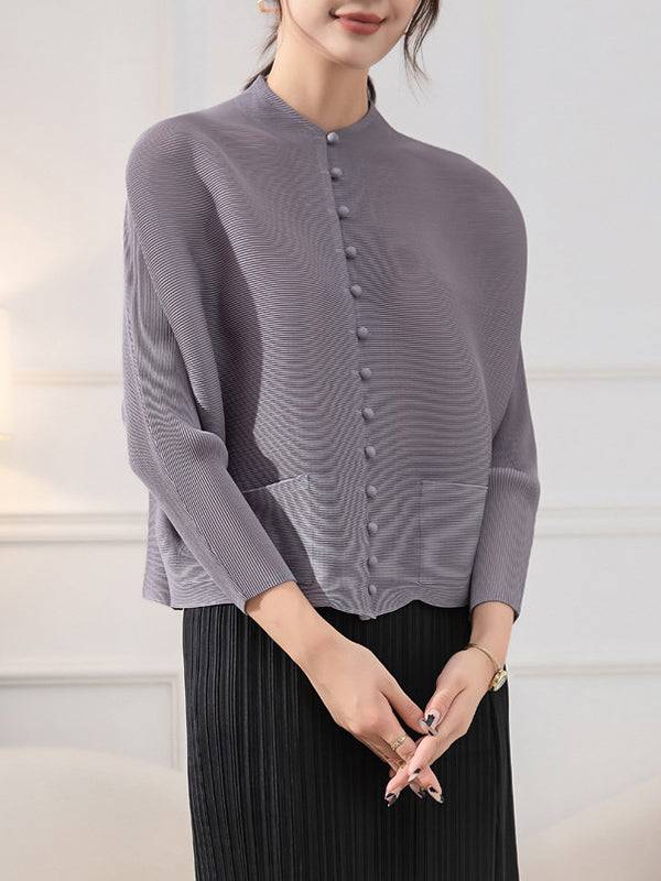 Pleated jacket with a stand collar, covered buttons and wide sleeves