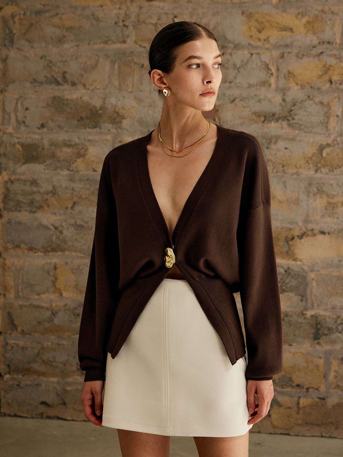 Women's deep V-neck cardigan with a single gold-tone button at the waist - dark brown