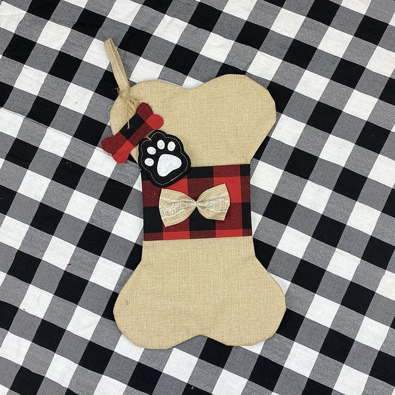 Bone-shaped Christmas stocking for a dog with a paw print tag and hanging loop - natural with check band