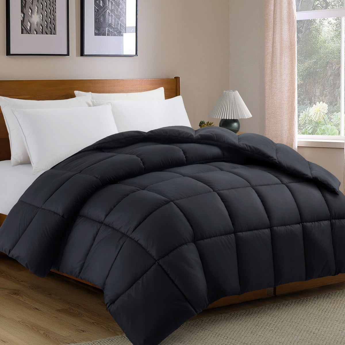 Quilted duvet without a cover on a made double bed - black