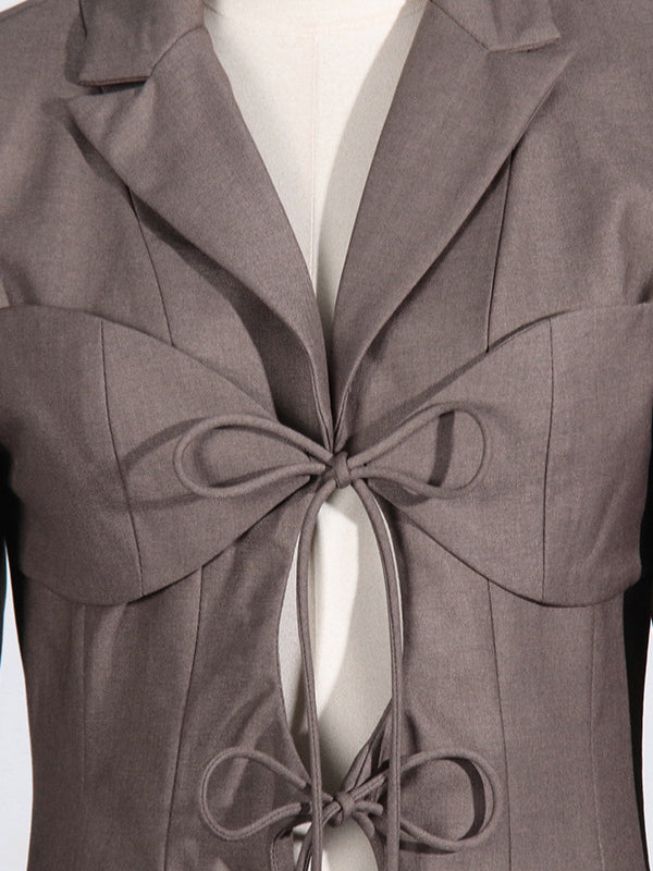 Tie-front blazer with a notch lapel and two flap pockets
