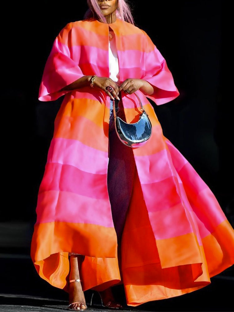 Floor-length open duster coat in wide pink and orange stripes