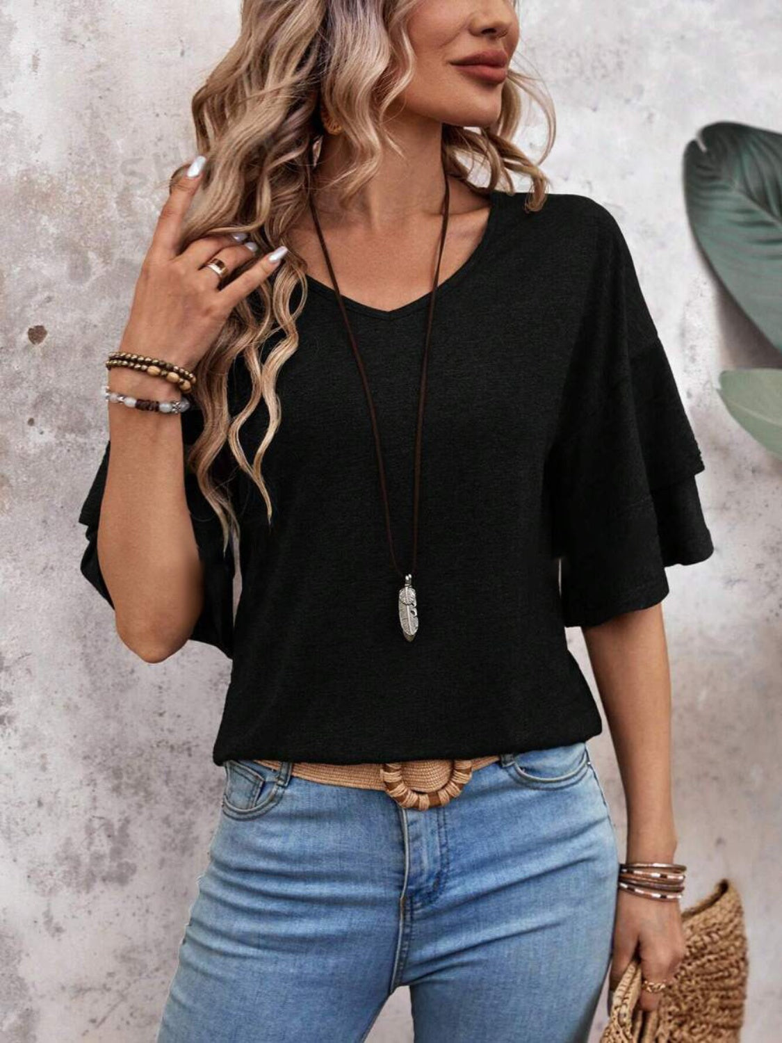 Women's layered flutter sleeve blouse in Black