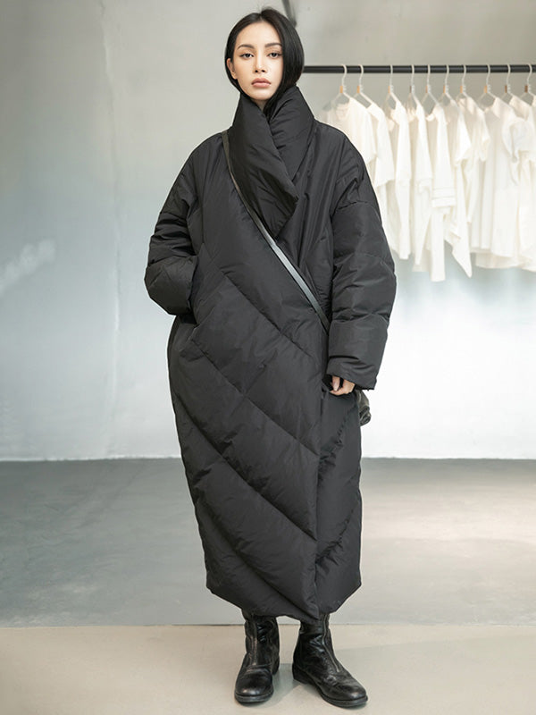 Long black padded coat with a scarf collar and diagonal quilting
