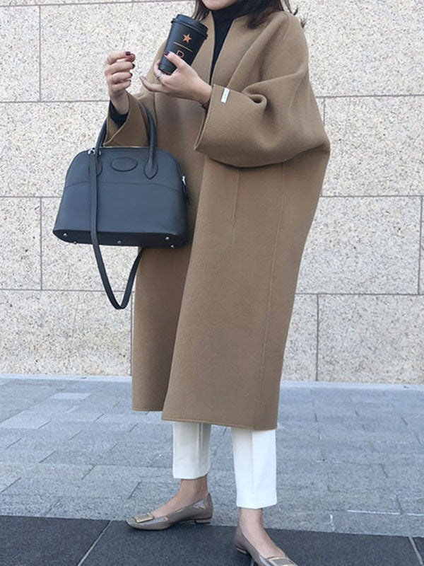 Collarless longline coat with dropped sleeves and an open front in coffee