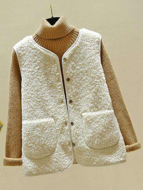 Sleeveless teddy gilet with a round neck and two patch pockets in cream