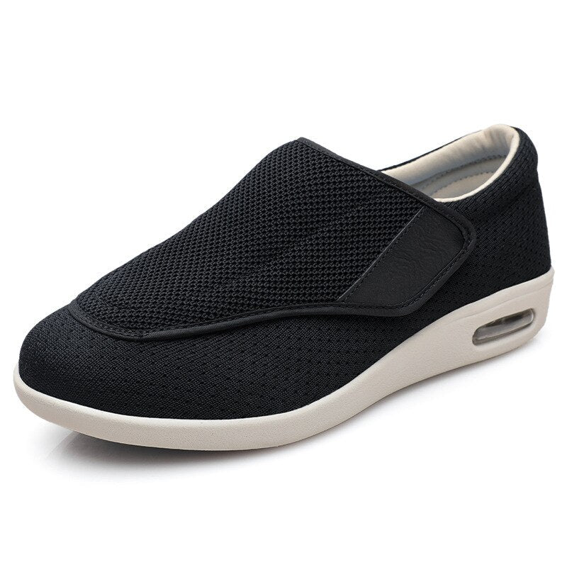 Ergonomic wide-fit shoes with an adjustable touch-fastening strap