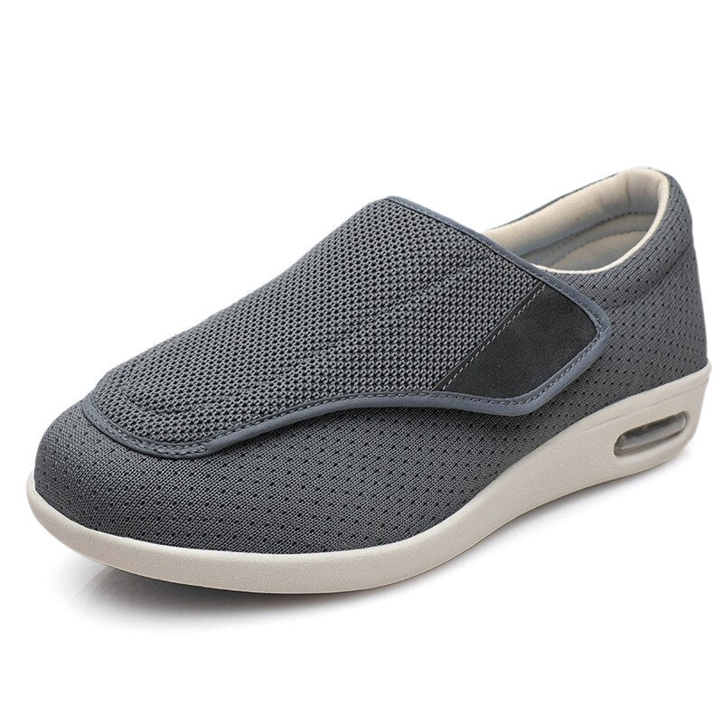 Ergonomic wide-fit shoes with an adjustable touch-fastening strap