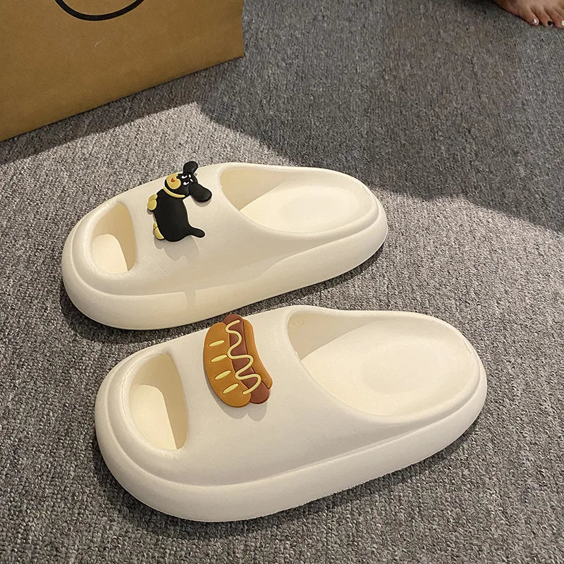 EVA mule slippers with closed toe, thick sole and playful charms on the instep
