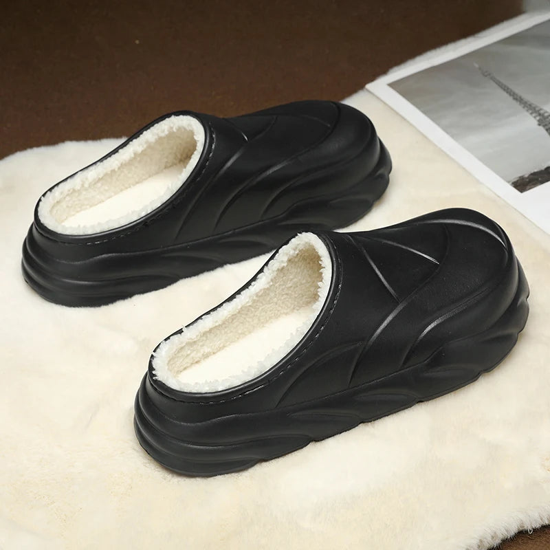 Platform slippers with EVA shell, teddy lining, open heel and thick wave-sculpted sole - black