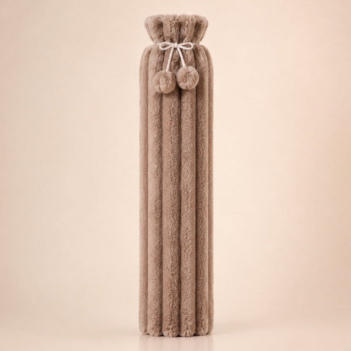 Extra long 83 cm hot water bottle with a plush cover and pompoms - brown ribbed