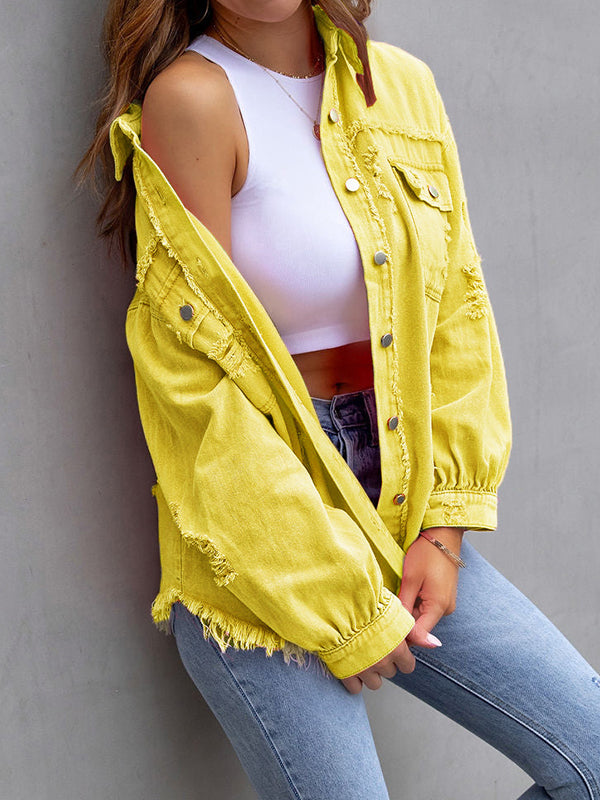 Oversized shirt jacket with frayed edges and chest pockets in yellow