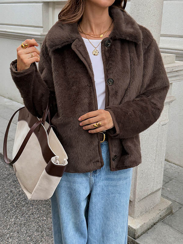 Short chocolate brown faux fur jacket with a flat collar and button front in chocolate