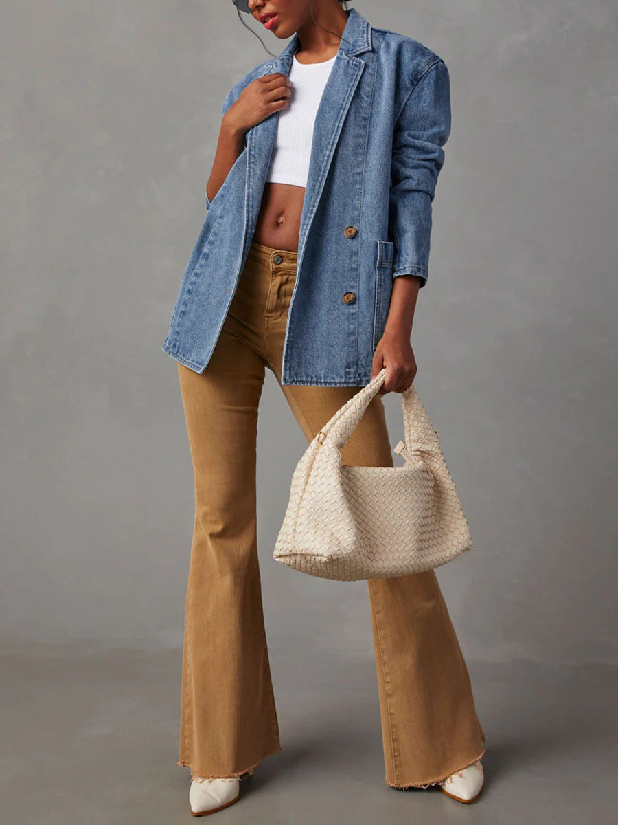 Mid wash denim blazer with a notched collar and four patch pockets
